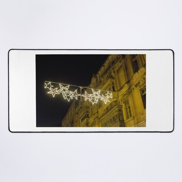 Item preview, Christmas Star Street Lights Hanging Above Historic Building Facade at Night Holiday Decoration designed and sold by Nmallia.