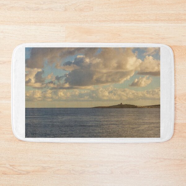 Item preview, Calm Ocean Horizon With Cloud-Filled Sky and Distant Coastal Island at Golden Hour designed and sold by Nmallia.