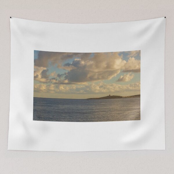 Item preview, Calm Ocean Horizon With Cloud-Filled Sky and Distant Coastal Island at Golden Hour designed and sold by Nmallia.