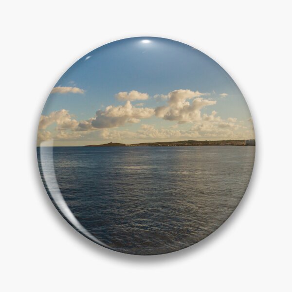 Item preview, Calm Ocean Horizon With Cloud-Filled Sky and Distant Coastal Island at Golden Hour designed and sold by Nmallia.