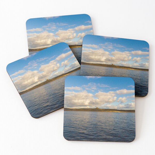 Item preview, Calm Ocean Horizon With Cloud-Filled Sky and Distant Coastal Island at Golden Hour designed and sold by Nmallia.