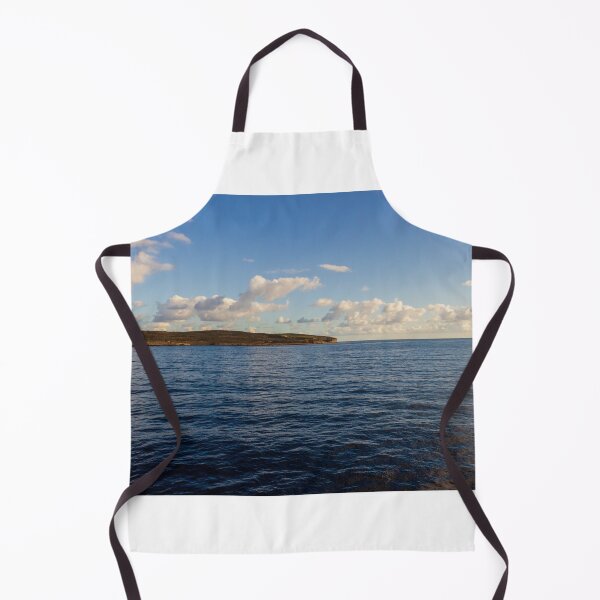 Item preview, Calm Ocean Horizon With Cloud-Filled Sky and Distant Coastal Island at Golden Hour designed and sold by Nmallia.