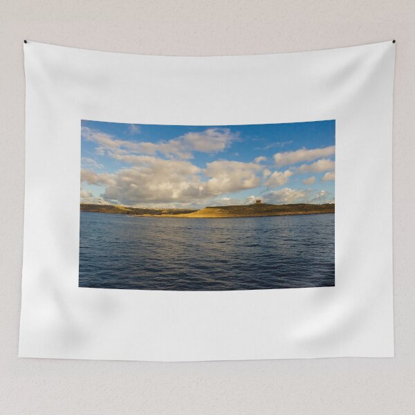 Item preview, Calm Ocean Horizon With Cloud-Filled Sky and Distant Coastal Island at Golden Hour designed and sold by Nmallia.