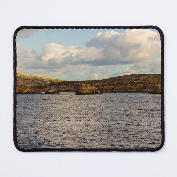 Item preview, Calm Ocean Horizon With Cloud-Filled Sky and Distant Coastal Island at Golden Hour designed and sold by Nmallia.