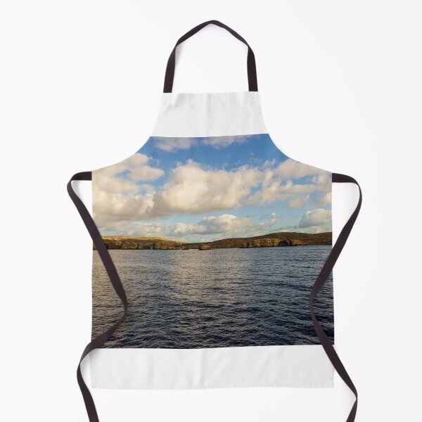 Item preview, Calm Ocean Horizon With Cloud-Filled Sky and Distant Coastal Island at Golden Hour designed and sold by Nmallia.