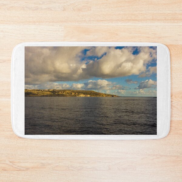 Item preview,  Calm Ocean Horizon With Cloud-Filled Sky and Distant Coastal Island at Golden Hour designed and sold by Nmallia.