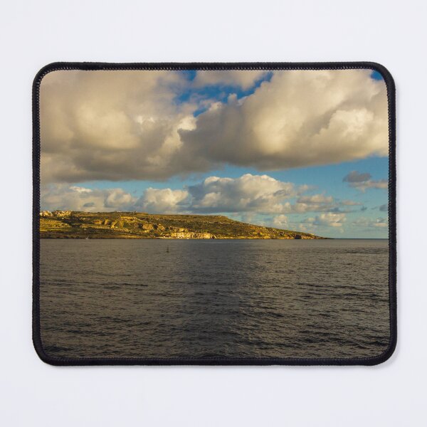 Item preview, Calm Ocean Horizon With Cloud-Filled Sky and Distant Coastal Island at Golden Hour designed and sold by Nmallia.