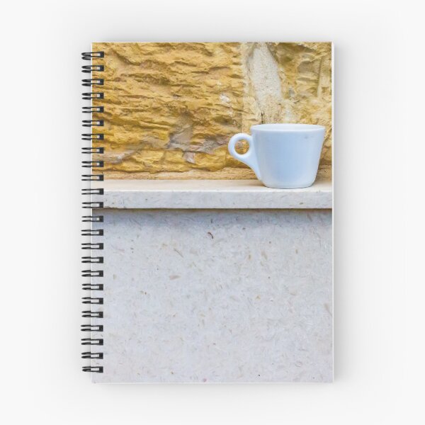 Item preview, White Coffee Cup on Stone Ledge Against Textured Yellow Wall Minimal Still Life designed and sold by Nmallia.