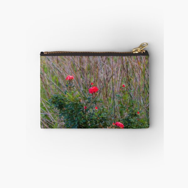 Item preview, Red Rose Bush With Blooming Roses and Buds Against Wild Grasses in Natural Garden designed and sold by Nmallia.