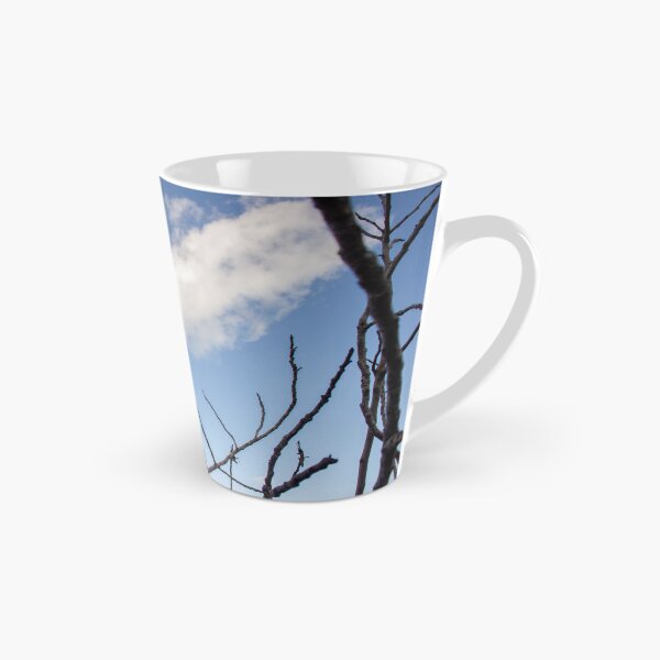 Item preview, Bare Tree Branches Silhouetted Against Blue Sky With Single Cloud Over Arid Landscape designed and sold by Nmallia.