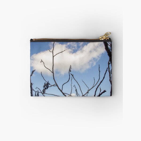Item preview, Bare Tree Branches Silhouetted Against Blue Sky With Single Cloud Over Arid Landscape designed and sold by Nmallia.