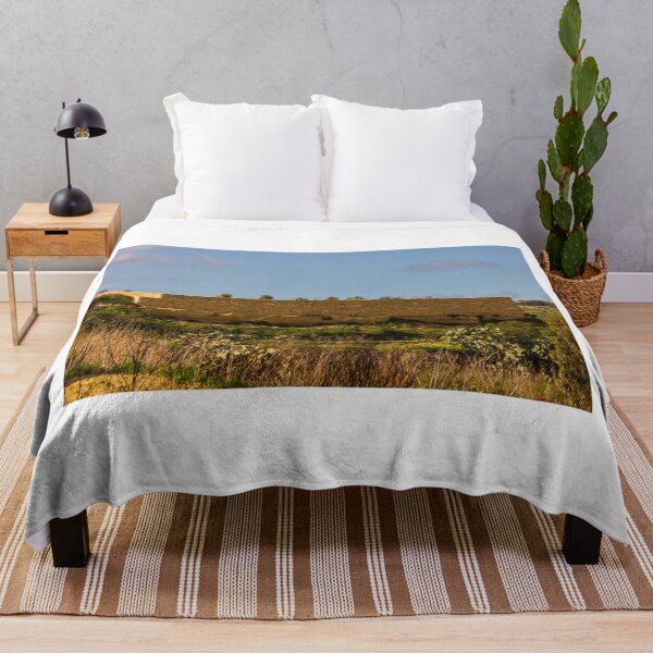 Item preview, Circular Dry Stone Fort Wall on Mediterranean Countryside Overlooking Green Fields and Cacti designed and sold by Nmallia.