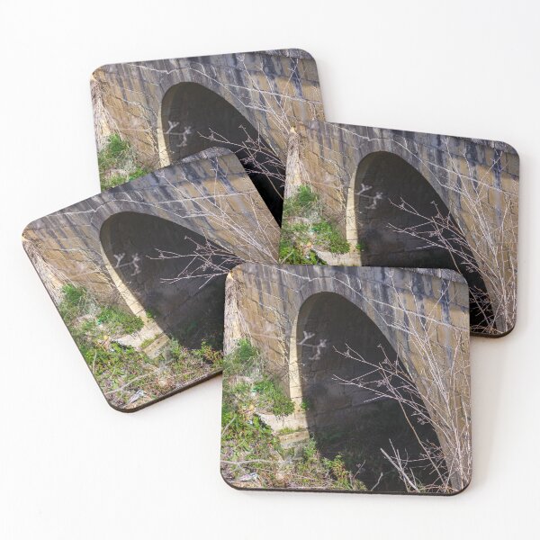 Item preview, Old Stone Arch Bridge With Dark Tunnel Entrance Surrounded by Overgrown Vegetation designed and sold by Nmallia.