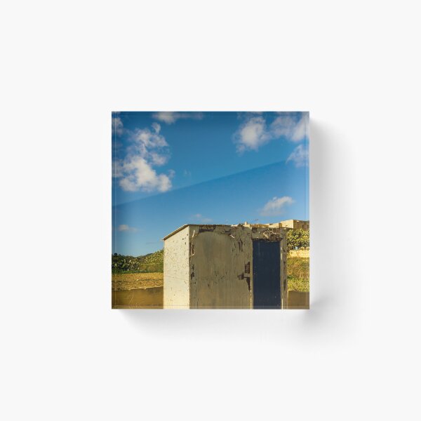 Item preview, Weathered Rural Shed With Peeling Paint And Blue Door Under Bright Cloudy Sky designed and sold by Nmallia.