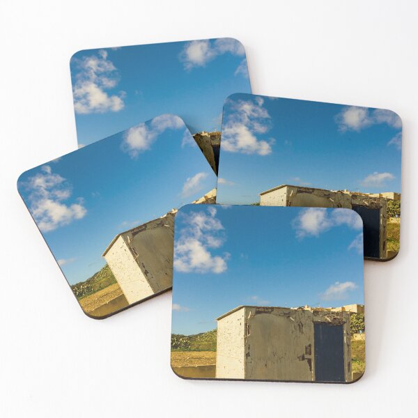 Item preview, Weathered Rural Shed With Peeling Paint And Blue Door Under Bright Cloudy Sky designed and sold by Nmallia.