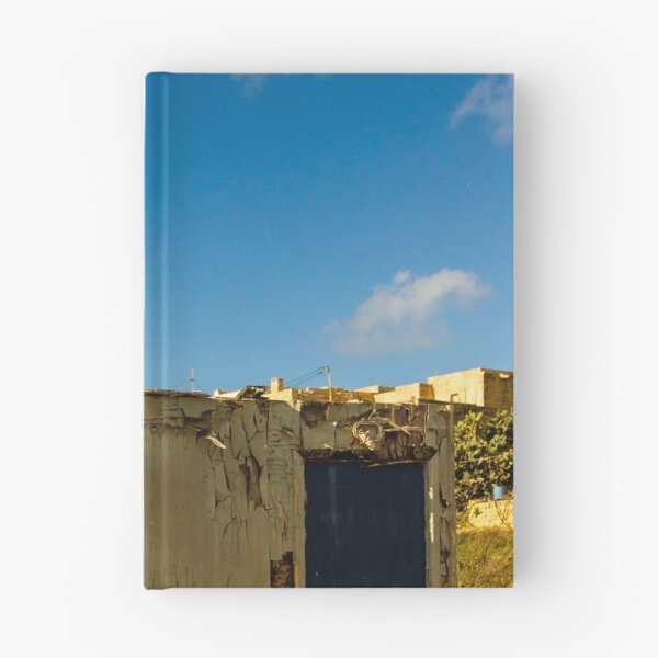 Item preview, Weathered Rural Shed With Peeling Paint And Blue Door Under Bright Cloudy Sky designed and sold by Nmallia.