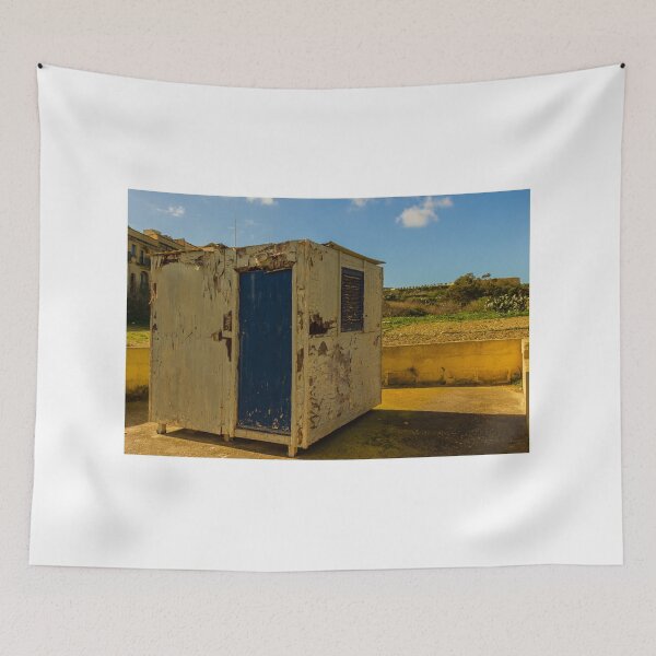 Item preview, Weathered Rural Shed With Peeling Paint And Blue Door Under Bright Cloudy Sky designed and sold by Nmallia.