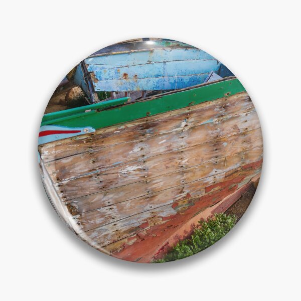 Item preview, Weathered Wooden Fishing Boats On Shore With Peeling Paint And Rustic Mediterranean Charm designed and sold by Nmallia.