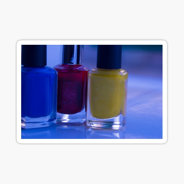"Close up of blue, red and yellow nail polish" Sticker for Sale by GemaIbarra Redbubble