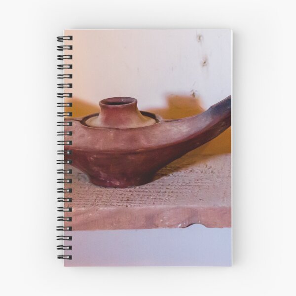 Item preview, Antique Terracotta Oil Lamp On Wooden Shelf With Warm Shadow And Rustic Texture designed and sold by Nmallia.