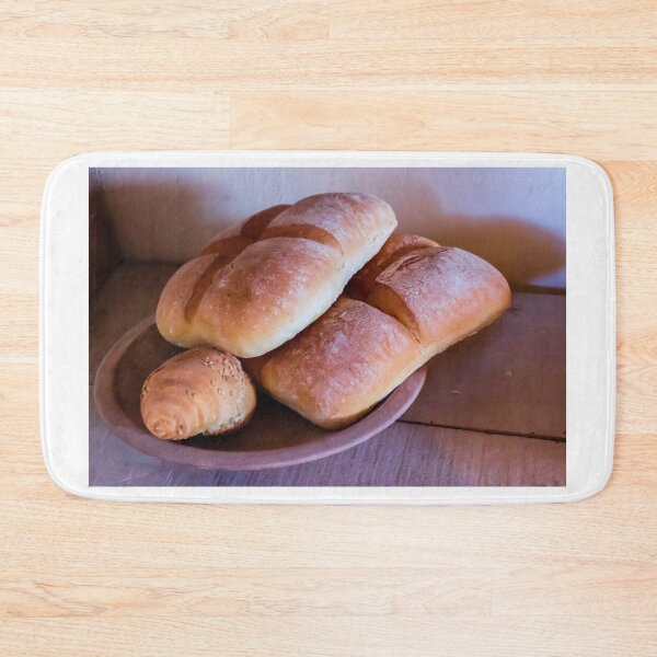 Item preview, Fresh Rustic Bread Rolls and Baked Loaves on Clay Plate in Warm Kitchen Light designed and sold by Nmallia.