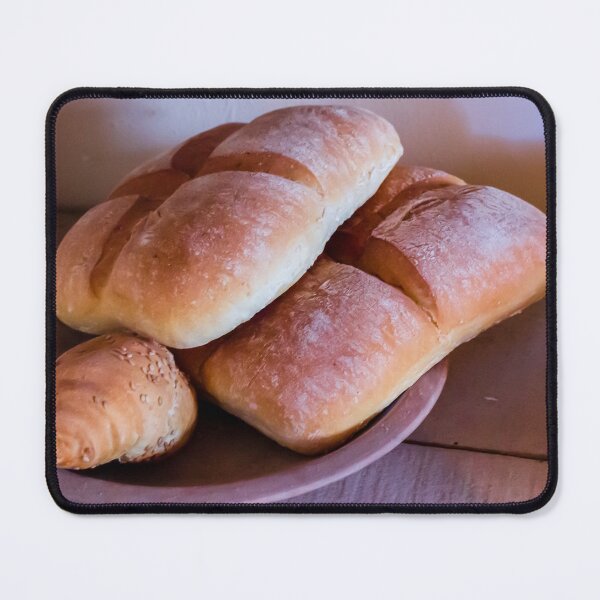 Item preview, Fresh Rustic Bread Rolls and Baked Loaves on Clay Plate in Warm Kitchen Light designed and sold by Nmallia.