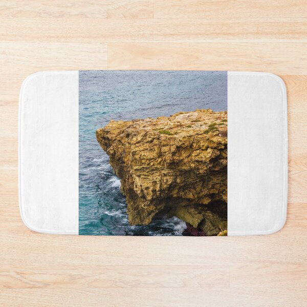 Item preview, Rocky Coastal Cliff Over Turquoise Ocean Waves With Eroded Limestone Seascape designed and sold by Nmallia.