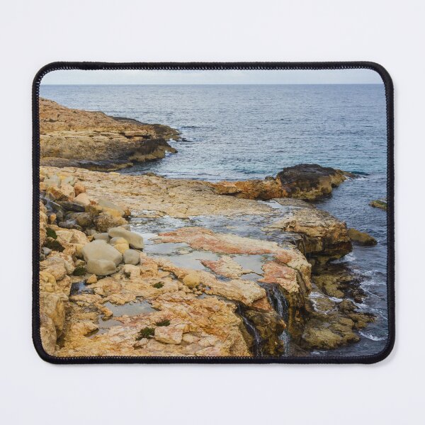 Item preview, Rocky Coastal Cliff Over Turquoise Ocean Waves With Eroded Limestone Seascape designed and sold by Nmallia.