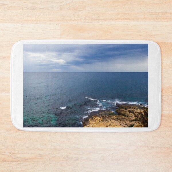 Item preview, Rocky Coastal Cliff Over Turquoise Ocean Waves With Eroded Limestone Seascape designed and sold by Nmallia.