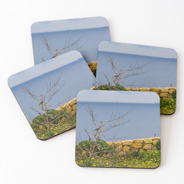 Item preview, Lonely Bare Tree With Small Bird by Stone Wall Overlooking Calm Sea and Wildflower Coastline designed and sold by Nmallia.