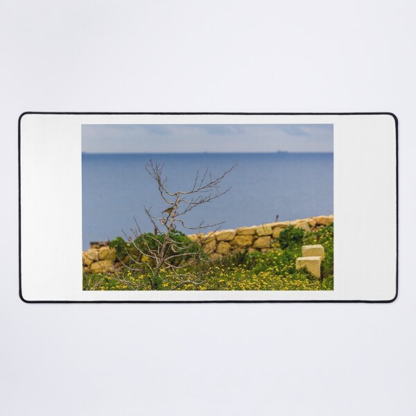 Item preview, Lonely Bare Tree With Small Bird by Stone Wall Overlooking Calm Sea and Wildflower Coastline designed and sold by Nmallia.