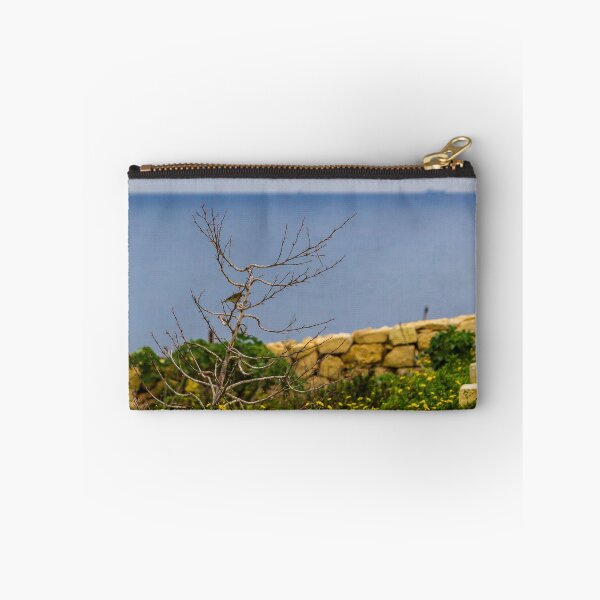 Item preview, Lonely Bare Tree With Small Bird by Stone Wall Overlooking Calm Sea and Wildflower Coastline designed and sold by Nmallia.