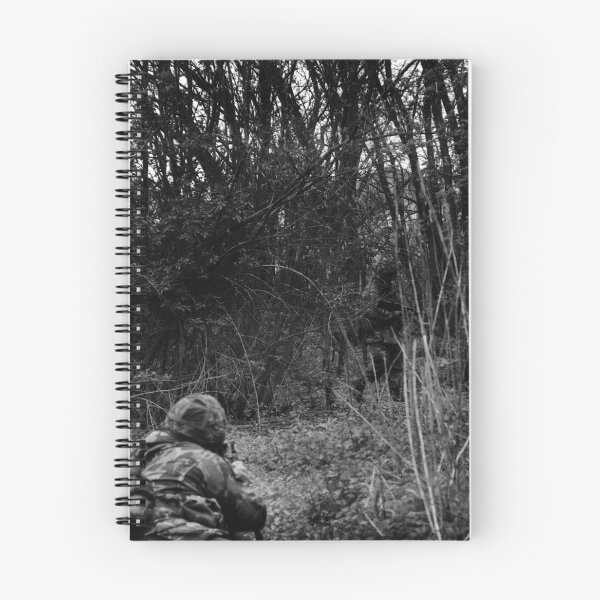 Item preview, Soldier's camouflage merging into the woods designed and sold by Richard Flint.