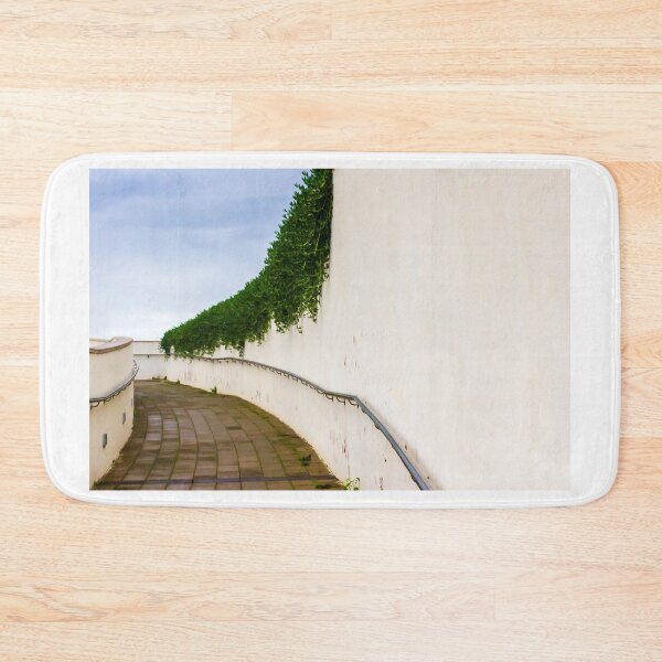 Item preview, Curved Walkway Along White Wall With Ivy and Metal Railing — Minimal Architectural Pathway designed and sold by Nmallia.