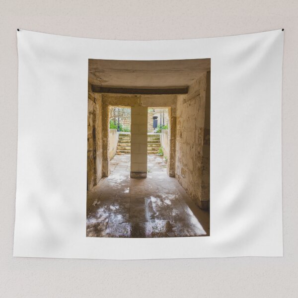 Item preview, Abandoned Stone Corridor Leading To Sunlit Stairway And Overgrown Courtyard Through A Narrow Doorway designed and sold by Nmallia.