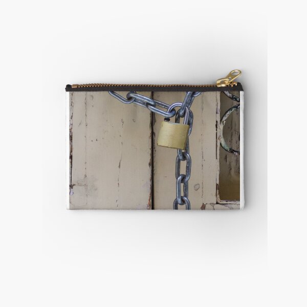 Item preview, Rustic Locked Door With Heavy Chain And Brass Padlock Securing Weathered Wooden Gate designed and sold by Nmallia.