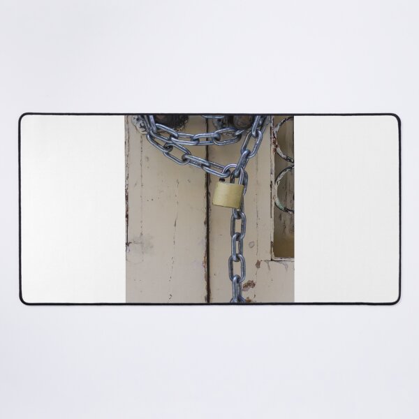Item preview, Rustic Locked Door With Heavy Chain And Brass Padlock Securing Weathered Wooden Gate designed and sold by Nmallia.