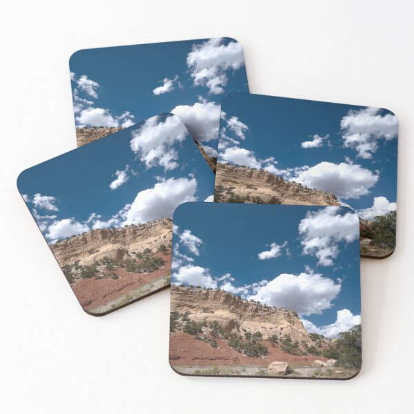 Item preview, Formation and road in Dinosaur National Monument with dramatic clouds designed and sold by lisavonbiela.