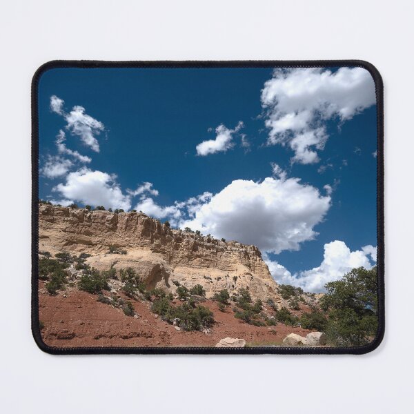 Item preview, Formation and road in Dinosaur National Monument with dramatic clouds designed and sold by lisavonbiela.