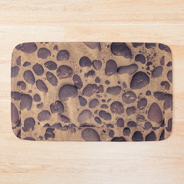 Item preview, Directly above shot of lava stones in the sand designed and sold by kristofbellens.