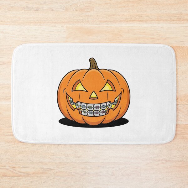 Item preview, Funny Halloween Pumpkin Wearing Dental Braces designed and sold by Rare By Hero.