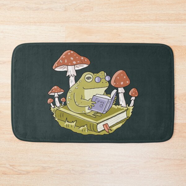 Item preview, Frog Reading a Book in Mushroom Forest Cute Cottagecore Aesthetic designed and sold by LeshanArt.