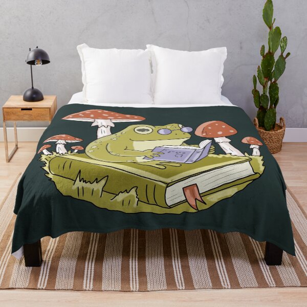 Item preview, Frog Reading a Book in Mushroom Forest Cute Cottagecore Aesthetic designed and sold by LeshanArt.