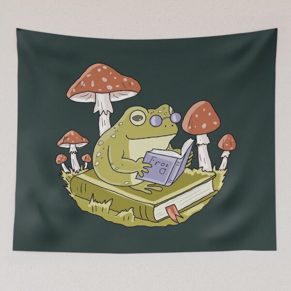 Item preview, Frog Reading a Book in Mushroom Forest Cute Cottagecore Aesthetic designed and sold by LeshanArt.