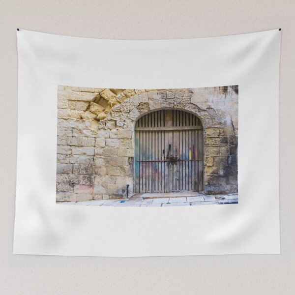 Item preview, Weathered Wooden Gate In Arched Stone Wall Of Historic Mediterranean Alleyway designed and sold by Nmallia.