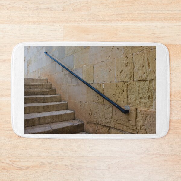 Item preview,  Stone Staircase With Potted Plant Against Weathered Limestone Wall Leading Up Between Parapets designed and sold by Nmallia.