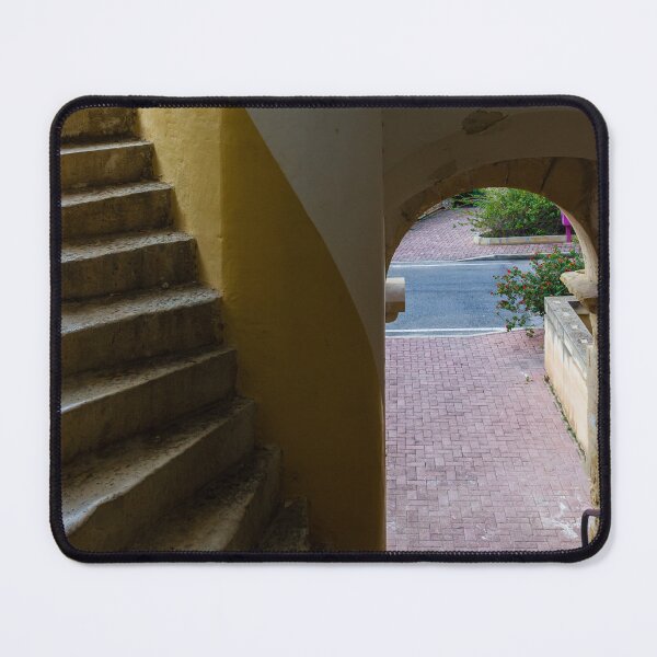 Item preview, Empty Yellow Stairwell With Worn Stone Steps And Black Metal Railing In Apartment Building designed and sold by Nmallia.