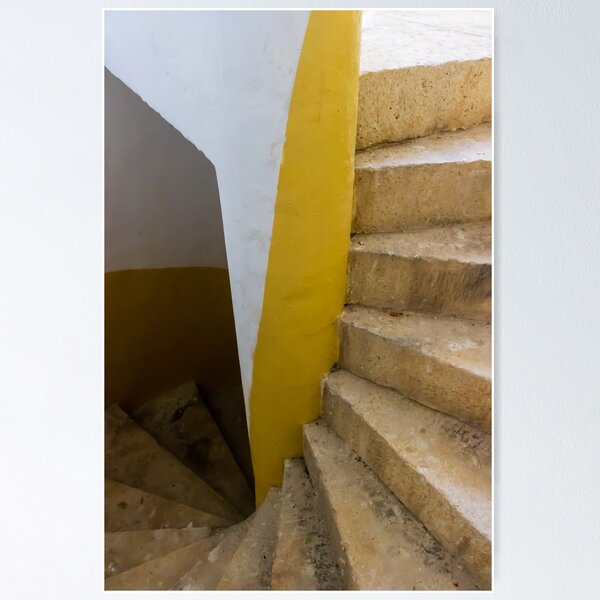 Item preview, Empty Yellow Stairwell With Worn Stone Steps And Black Metal Railing In Apartment Building designed and sold by Nmallia.