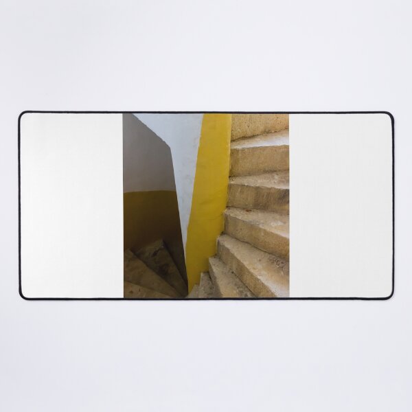 Item preview, Empty Yellow Stairwell With Worn Stone Steps And Black Metal Railing In Apartment Building designed and sold by Nmallia.
