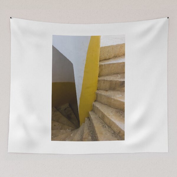 Item preview, Empty Yellow Stairwell With Worn Stone Steps And Black Metal Railing In Apartment Building designed and sold by Nmallia.